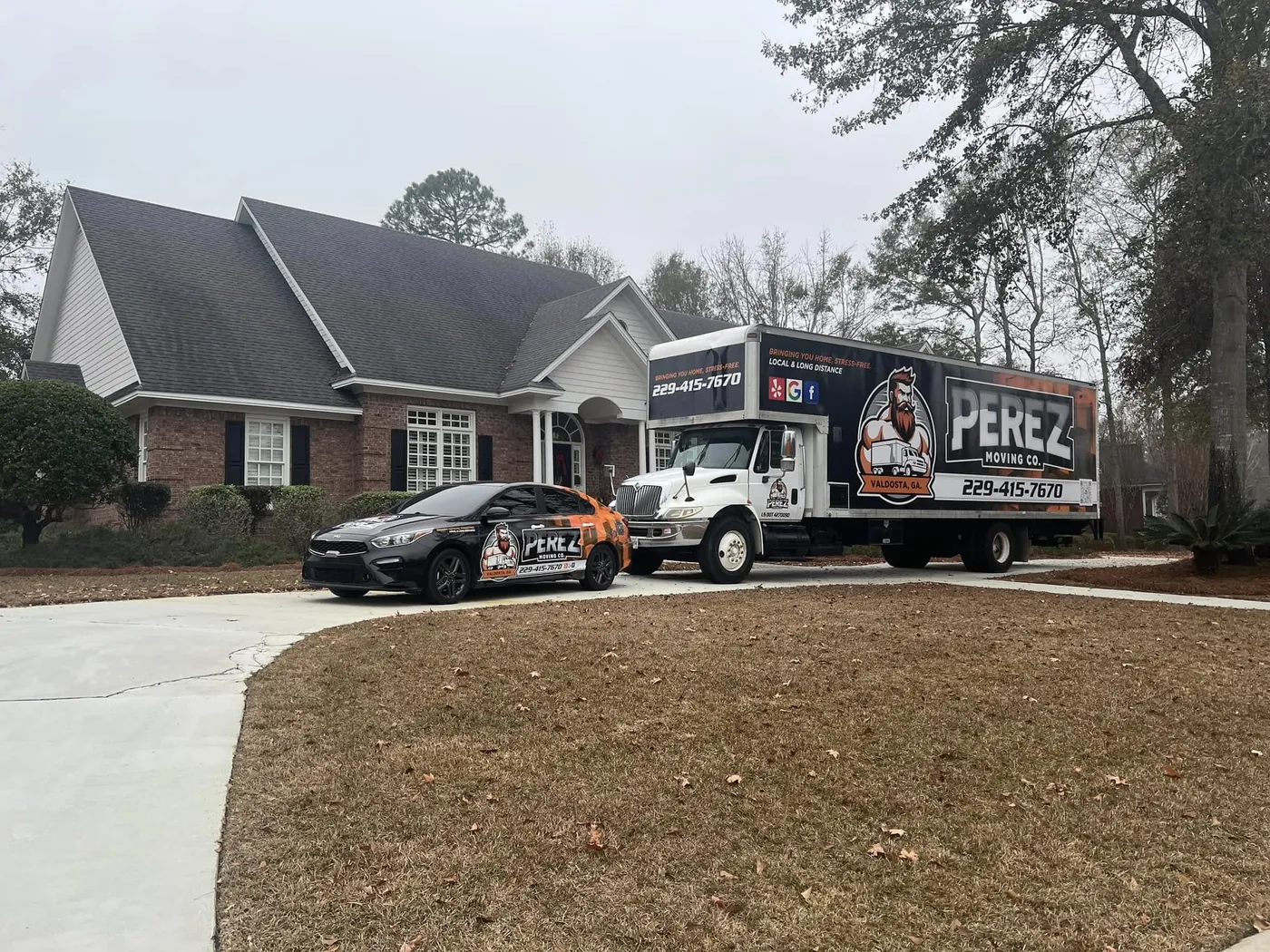 Perez Moving Co truck parked at a customer's home on moving day