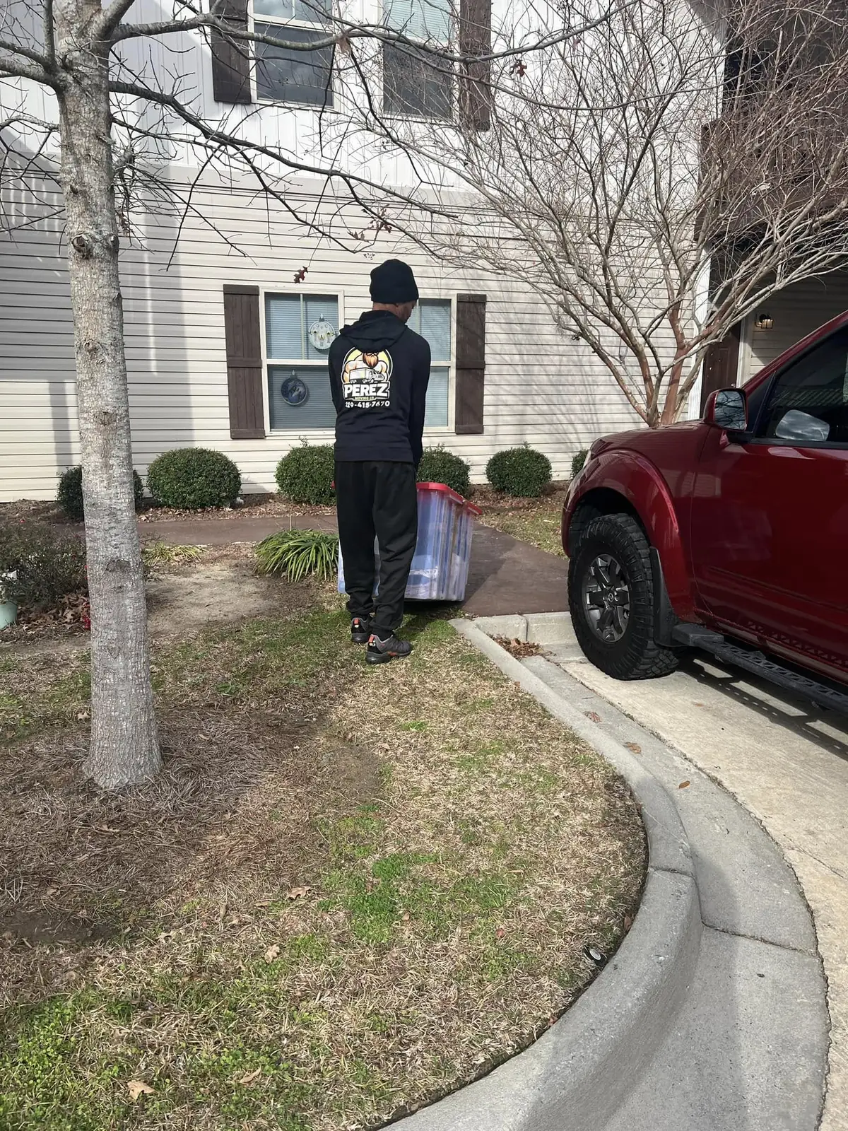 Perez Moving Co mover unloading the truck at a South Georgia home